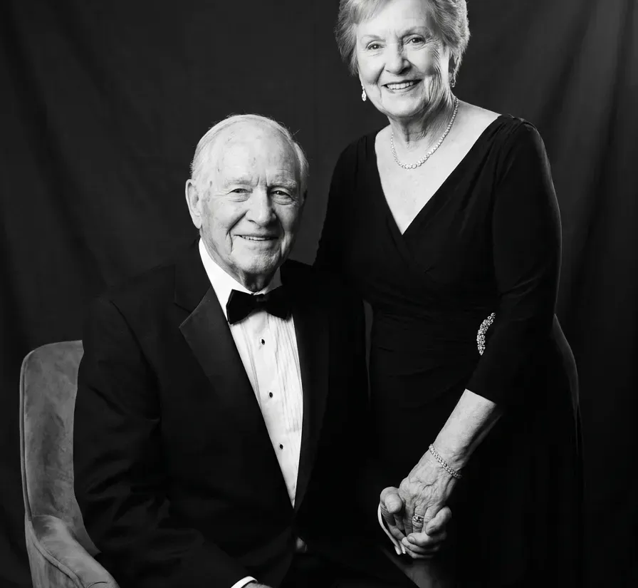 Concept portrait of an older couple dressed for a celebration