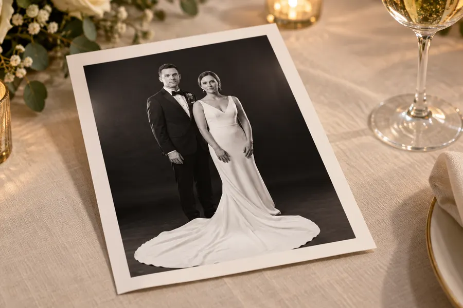 Concept of a black-and-white couple portrait print on a reception table