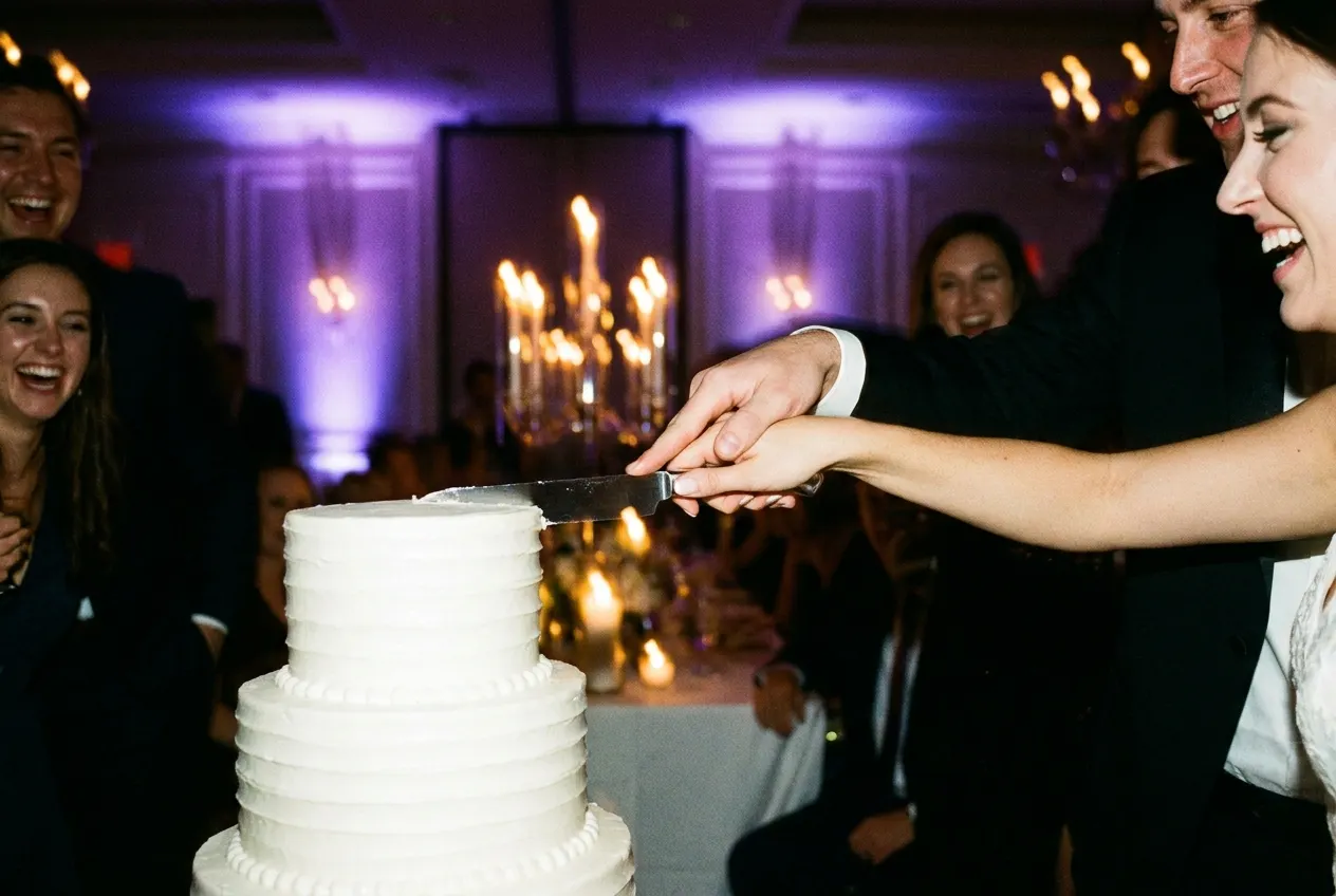 Flash-frozen moment of the cake cutting